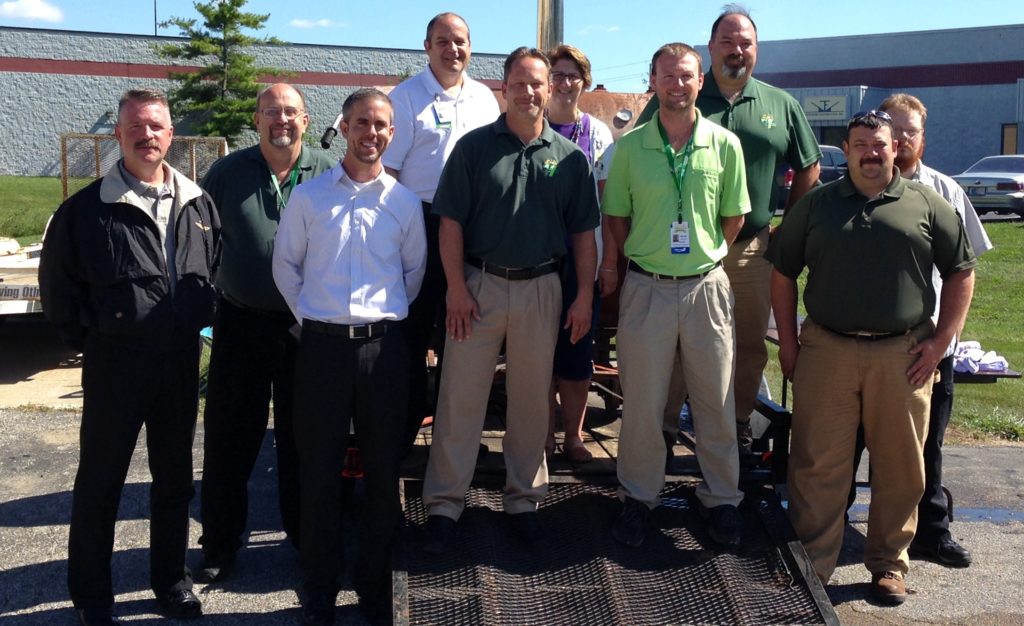 The Seals Ambulance local management team gathers at a cookout to celebrate the company’s 50th anniversary. From left right are (first row) Director of Operations Jim White, Director of Marketing James Simmons, Operations Manager Ryan Bertram, Operations Manager Jacob Theurer, Director of Training Michael Roethler (back row) Operations Manager Michael O’Brien, President Randal Seals, Vice President Marie Seals and Director of Human Resources. John Hough.